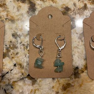 Green dangly earrings